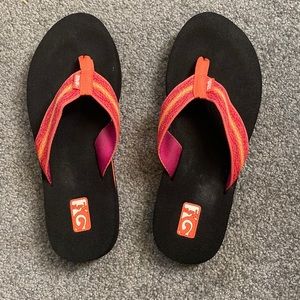 Teva flip flops orange